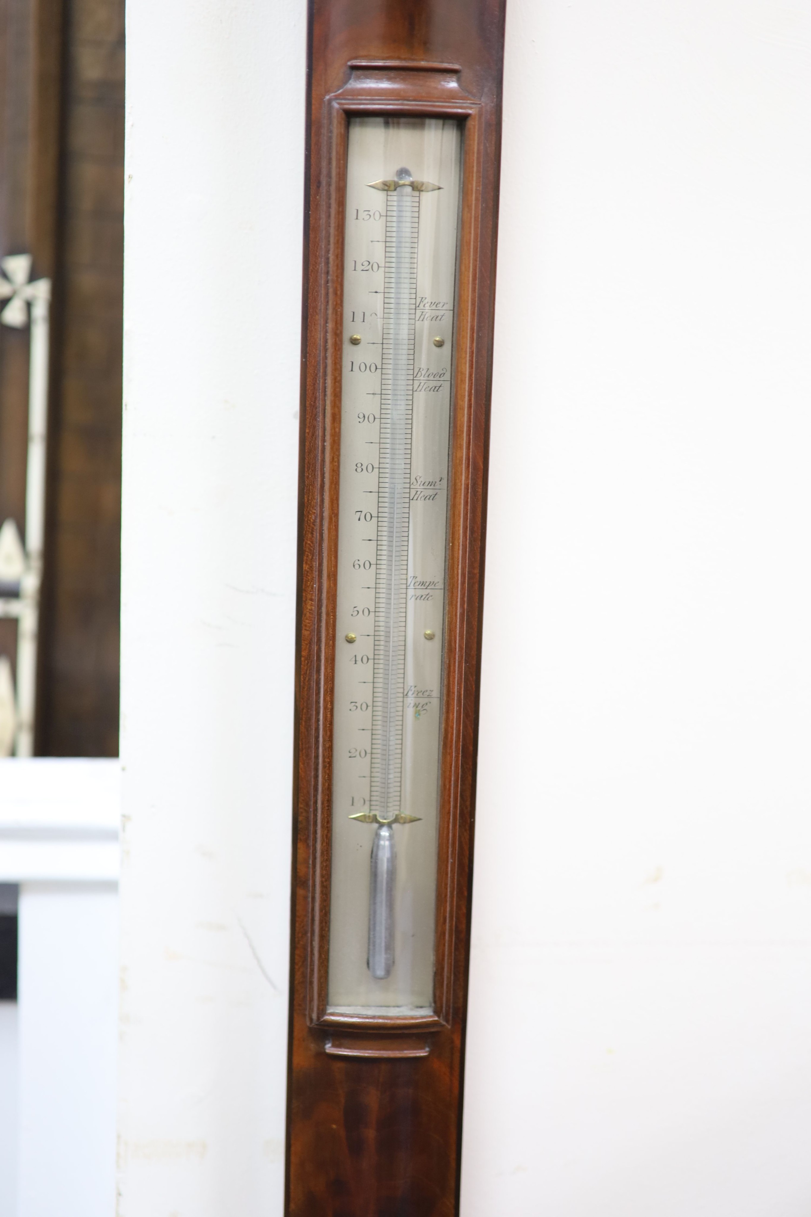 A George III mahogany bow front stick barometer, by D. Cohen & Son, Newcastle upon Tyne H 95cm.
